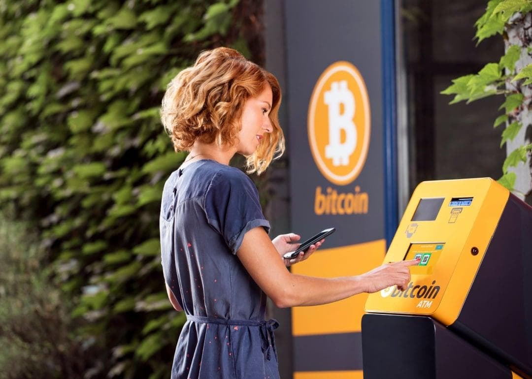 woman at bitcoin atm