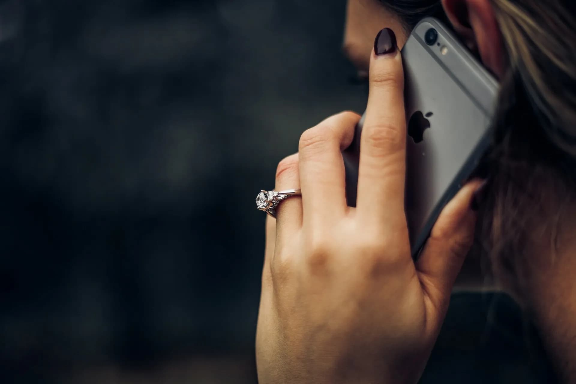 woman answering call wondering who's calling me?